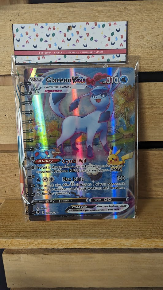 Pokémon card notebooks are packaged with a pencil, two random stickers, and two random temporary tattoos.