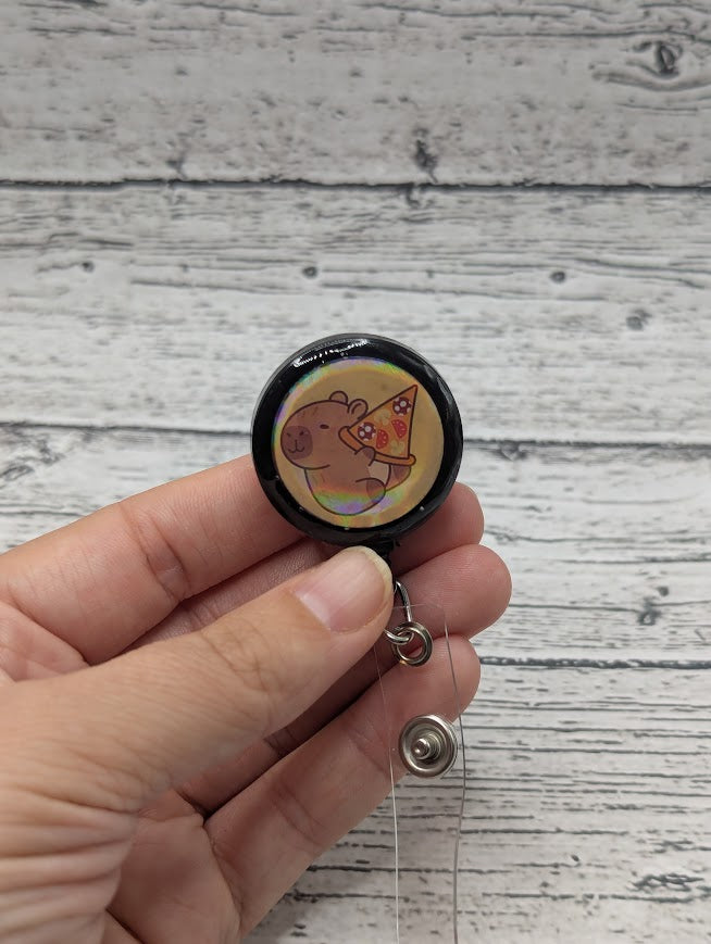 Capybarra Pizza Badge Reel