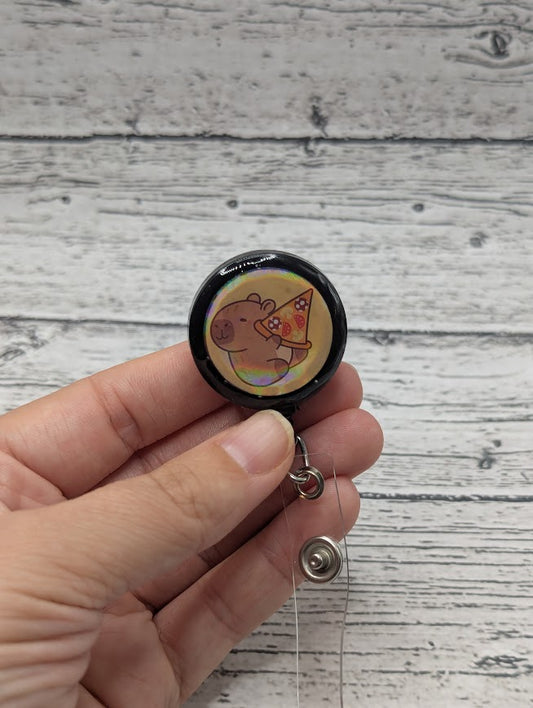 Capybarra Pizza Badge Reel